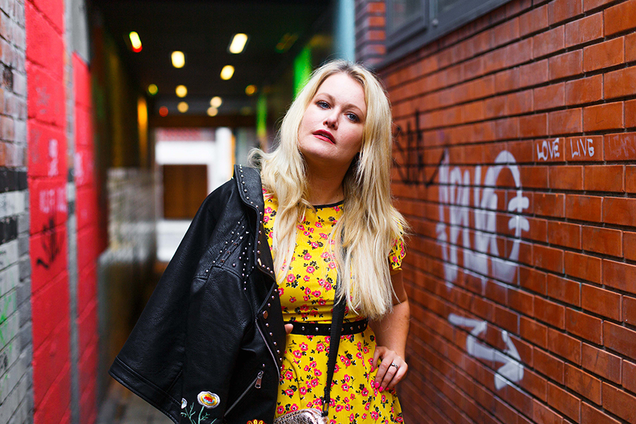 Lorna Weightman wearing Penneys yellow floral dress and leather jacket